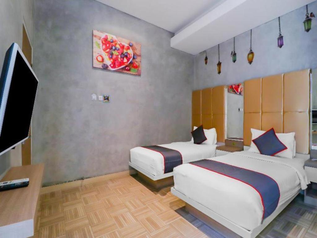 Collection O 31 The Batik Bed And Coffee Bandung Hotell Exteriör bild